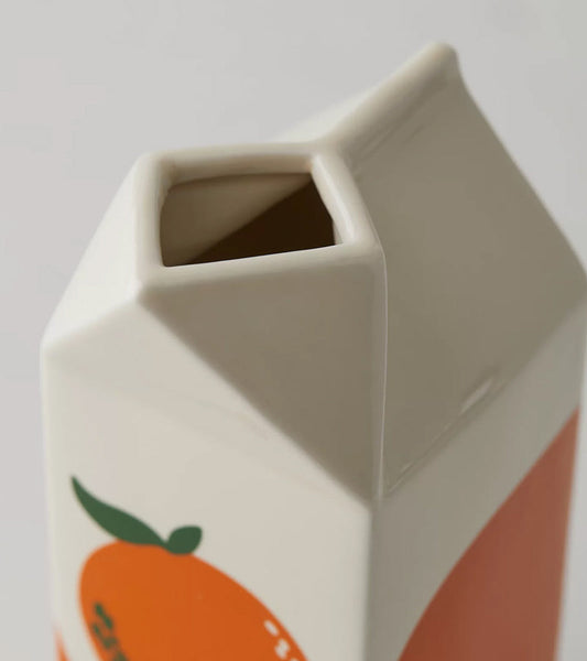 Vase orangensaft packung