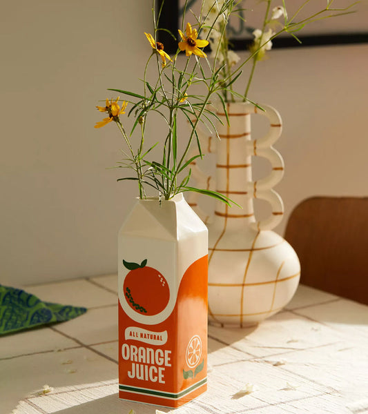 Vase orangensaft packung
