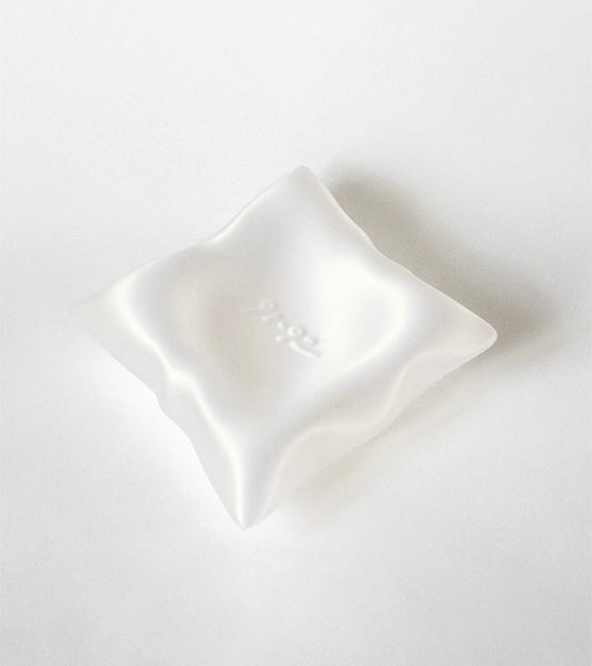 Kissendesign mit Ablageschälchen