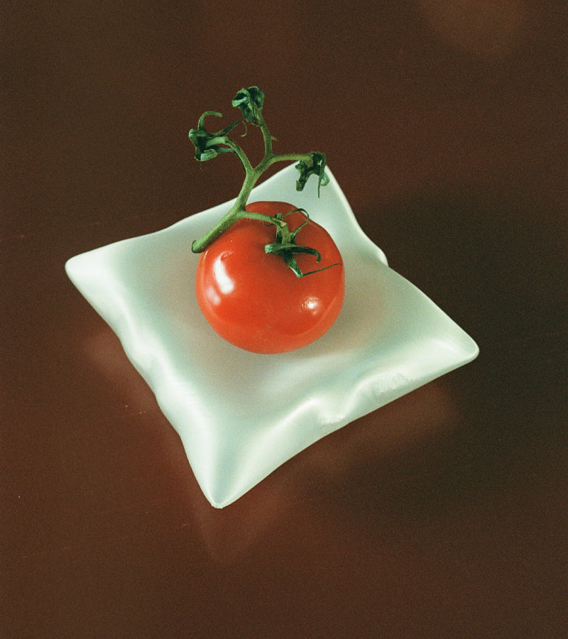 Kissendesign mit Ablageschälchen