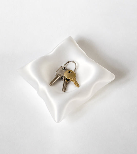 Kissendesign mit Ablageschälchen